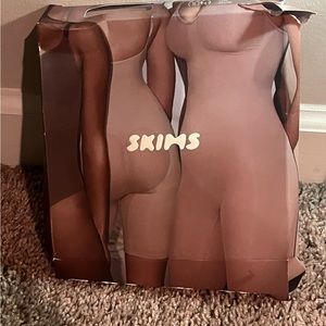 Skims NWTS body suit tan sz xxs/xs